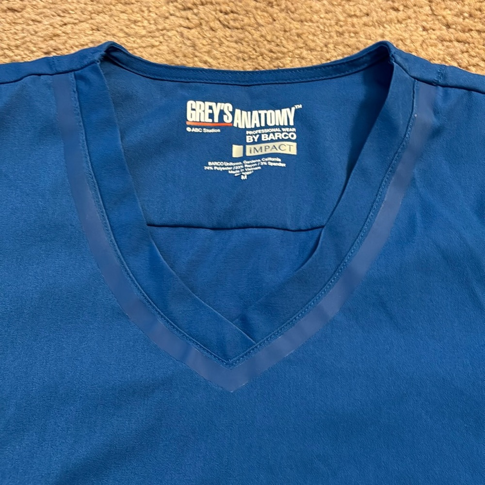 Grey’s Anatomy. Royal Blue size medium scrub top.